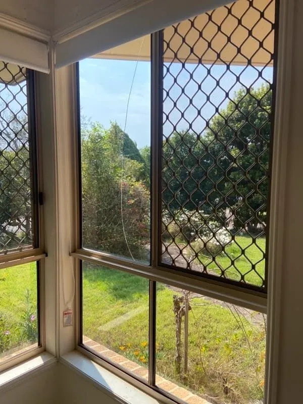 Glass window with crack before repair, Gold Coast